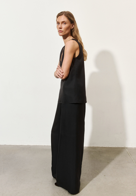 Шовкові wide-leg штани в чорному кольорі / 1