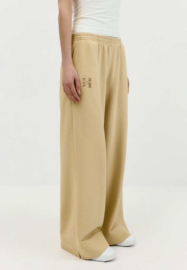 Palazzo pants in buttery cream
